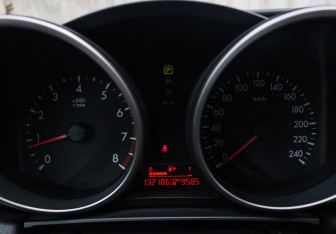 Подержанный автомобиль Mazda 3 Hatchback 2010 года (19 фото)