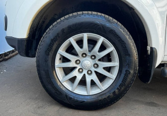 Подержанный автомобиль Mitsubishi Pajero Sport 2012 года (13 фото)