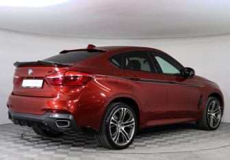 Подержанный автомобиль BMW X6 2016 года (2 фото)