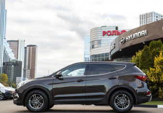 Подержанный автомобиль Hyundai Santa Fe 2015 года (6 фото)