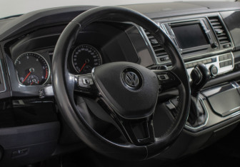 Подержанный автомобиль Volkswagen Multivan 2016 года (14 фото)