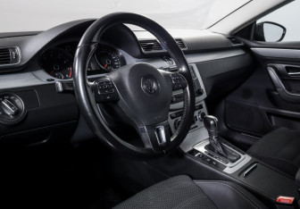 Подержанный автомобиль Volkswagen Passat CC 2013 года (14 фото)