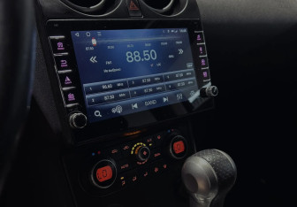 Подержанный автомобиль Nissan Qashqai+2 2009 года (11 фото)