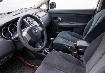 Подержанный автомобиль Nissan Tiida Sedan 2012 года (10 фото)