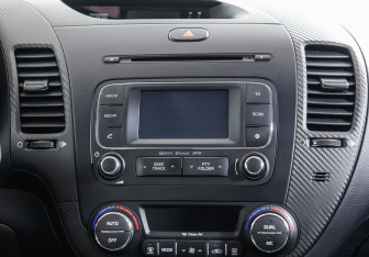 Подержанный автомобиль Kia Cerato Coupe 2013 года (8 фото)