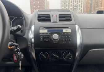 Подержанный автомобиль Suzuki SX4 Hatchback 2012 года (14 фото)