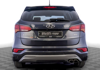 Подержанный автомобиль Hyundai Santa Fe 2015 года (6 фото)