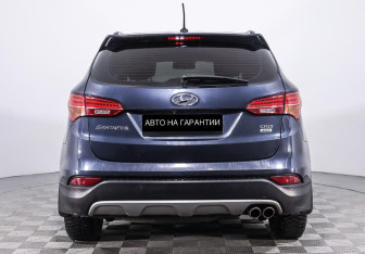 Подержанный автомобиль Hyundai Santa Fe 2014 года (4 фото)