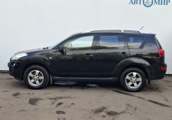 Подержанный автомобиль Peugeot 4007 2011 года (8 фото)