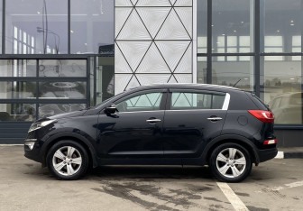 Подержанный автомобиль Kia Sportage 2011 года (8 фото)