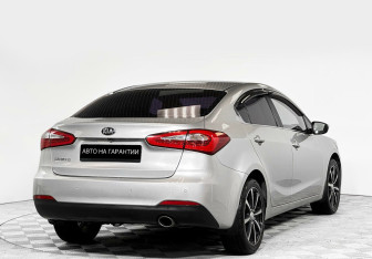 Подержанный автомобиль Kia Cerato Sedan 2014 года (5 фото)