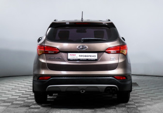 Подержанный автомобиль Hyundai Santa Fe 2015 года (6 фото)