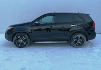 Подержанный автомобиль Kia Sorento 2012 года (8 фото)