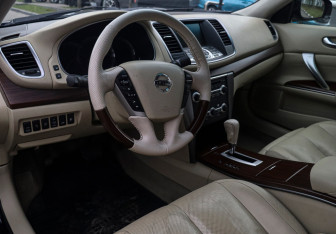 Подержанный автомобиль Nissan Teana 2010 года (11 фото)