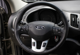 Подержанный автомобиль Kia Sportage 2012 года (15 фото)