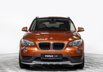Подержанный автомобиль BMW X1 2014 года (2 фото)
