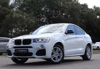 Подержанный автомобиль BMW X4 2015 года (21 фото)