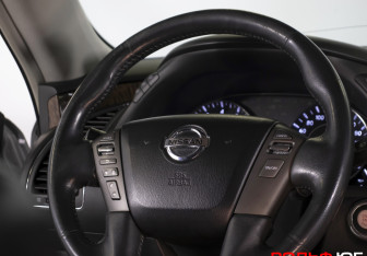 Подержанный автомобиль Nissan Patrol 2014 года (14 фото)