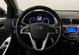 Подержанный автомобиль Hyundai Solaris Sedan 2014 года (13 фото)