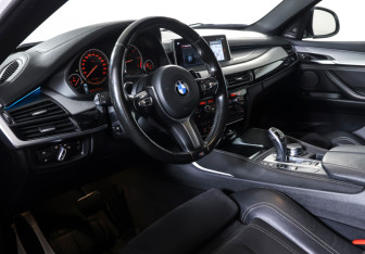 Подержанный автомобиль BMW X6 2018 года (14 фото)