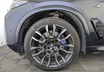 Подержанный автомобиль BMW X5 2025 года (14 фото)