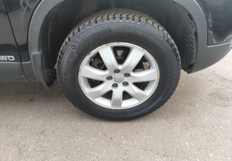 Подержанный автомобиль Kia Sorento 2011 года (11 фото)