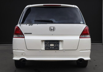 Подержанный автомобиль Honda Odyssey Compactvan 2004 года (6 фото)