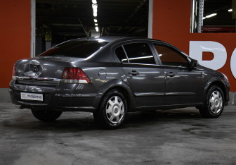 Подержанный автомобиль Opel Astra Sedan 2012 года (5 фото)