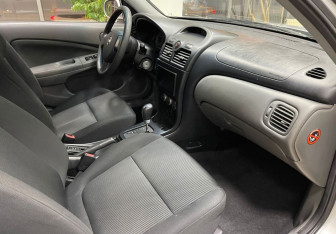 Подержанный автомобиль Nissan Almera Classic 2010 года (10 фото)