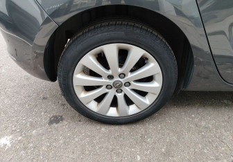 Подержанный автомобиль Opel Astra Sedan 2014 года (11 фото)