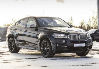 Подержанный автомобиль BMW X6 2015 года (3 фото)