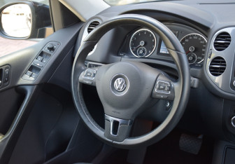 Подержанный автомобиль Volkswagen Tiguan 2014 года (8 фото)