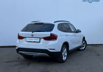 Подержанный автомобиль BMW X1 2014 года (5 фото)