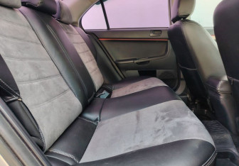 Подержанный автомобиль Mitsubishi Lancer Sedan 2013 года (11 фото)