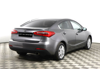 Подержанный автомобиль Kia Cerato Sedan 2014 года (3 фото)