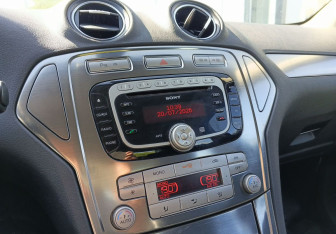Подержанный автомобиль Ford Mondeo Sedan 2010 года (14 фото)