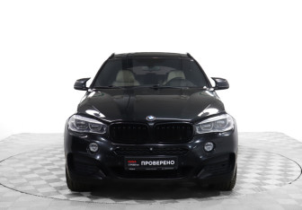 Подержанный автомобиль BMW X6 2015 года (2 фото)