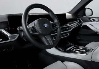 Подержанный автомобиль BMW X5 2025 года (14 фото)