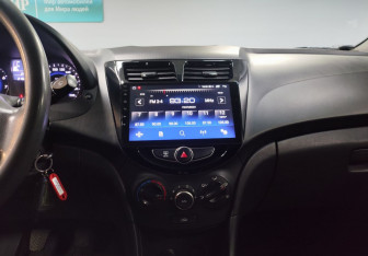 Подержанный автомобиль Hyundai Solaris Sedan 2014 года (15 фото)