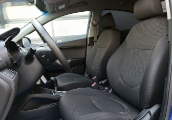 Подержанный автомобиль Kia Rio Sedan 2012 года (18 фото)
