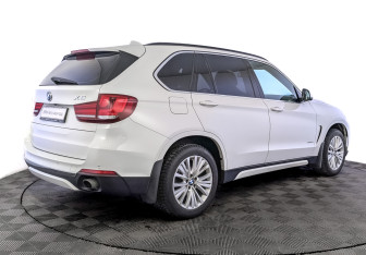 Подержанный автомобиль BMW X5 2015 года (5 фото)