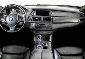 Подержанный автомобиль BMW X6 M 2011 года (11 фото)