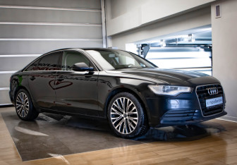 Подержанный автомобиль Audi A6 Sedan 2013 года (3 фото)