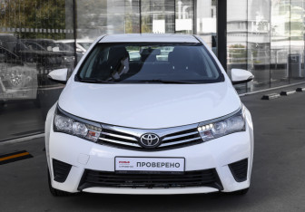 Подержанный автомобиль Toyota Corolla Sedan 2013 года (2 фото)