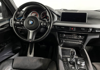 Подержанный автомобиль BMW X6 2018 года (15 фото)