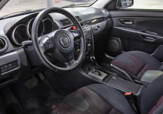 Подержанный автомобиль Mazda 3 Hatchback 2006 года (15 фото)