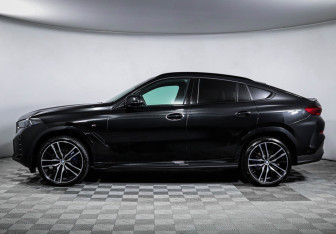 Подержанный автомобиль BMW X6 2025 года (8 фото)