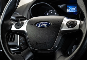 Подержанный автомобиль Ford Focus Hatchback 2014 года (11 фото)