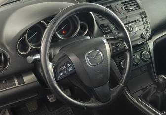 Подержанный автомобиль Mazda 6 Sedan 2010 года (12 фото)