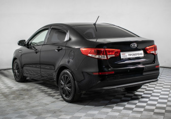 Подержанный автомобиль Kia Rio Sedan 2015 года (7 фото)